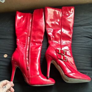 Sexy high red leather boots